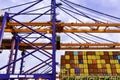 Huge panamax size container vessel discharging and loading container cargo at port terminal. Royalty Free Stock Photo