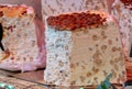 A huge piece of French white nougat with whole almonds and walnut pieces