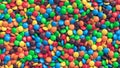 Huge pile of colorful coated chocolate candies background