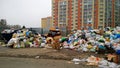 Huge pile of garbage near houses