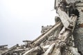 A huge pile of gray concrete debris from piles and stones of the destroyed building. Copy space Royalty Free Stock Photo