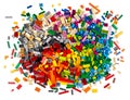 Huge pile of stackable plastic toy bricks top view isolated white background. Colorful texture childhood education and