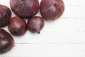 Huge pile of very large fresh and red beets on a white wooden table. beautiful fresh market organic beetroot in a large Royalty Free Stock Photo