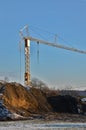 Huge piles of clay and soil are materials moved during the excavation of the foundations of an apartment building. a large constru Royalty Free Stock Photo