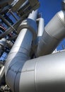 Huge pipes transfer the heat from the exchangers in a Victorian refinery. Royalty Free Stock Photo