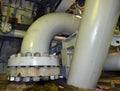 Huge pipes and valve on lower deck of offshore platform