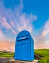 Huge postbox bottom view under pink clouds