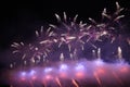 Huge purple fireworks in the sky with fog