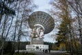 Huge radio telescope in the forest