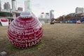 Red Christmas Ornament in the park at World of Coca Cola Olympic Centennial Park