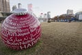 Red Christmas Ornament in the park at World of Coca Cola Olympic Centennial Park