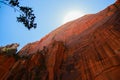 Huge red rocks in Zion Canyon National Park, Utah. USA. Wide shot, low angle, Sun. Hiking adventures, traveling, rocks Royalty Free Stock Photo