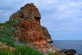 Amazing big red rock above the sea Royalty Free Stock Photo