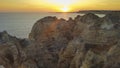 Huge rock at the cliff beach of Praia da Marinha, lovely hidden beach near Lagoa Algarve Portugal Royalty Free Stock Photo