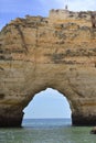 Huge rock at the cliff beach of Praia da Marinha, lovely hidden beach near Lagoa Algarve Portugal Royalty Free Stock Photo