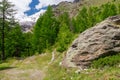 Huge rock by a kiking trail in Saas valley, Valais, Switzerland