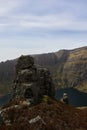 huge rock on a mountain with a bottom lake in a valley. Comeragh Mountains, Waterford, Ireland