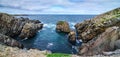 Huge rocks and boulder outcrops along Cape Bonavista coastline in Newfoundland, Canada. Royalty Free Stock Photo