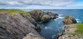 Huge rocks and boulder outcrops along Cape Bonavista coastline in Newfoundland, Canada.