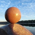 A huge round stone miraculously keeps balance