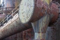 Huge rusting pipes with catwalks, steel mill industrial complex Royalty Free Stock Photo