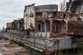 Huge rusty pieces of decommissioned marine ship.