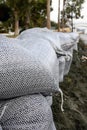 Huge sandbags along the coastline of the tourist resort of Limassol, Cyprus. Protection from sea waves, storms, hurricanes