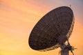 Huge Satellite Dish in evening twilight sky at sunset Royalty Free Stock Photo