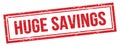 HUGE SAVINGS text on red grungy vintage stamp