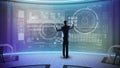 Calm programmer standing in front of a large screen with his hands up