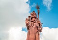 Huge Shiva statue Mangal Mahadev is a 33 m art piece in Ganga talao temple on the blue cloudy sky, Mauritius island Royalty Free Stock Photo