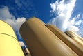 Huge silos store the chemicals and mulch necessary for the manufacture of newspaper