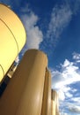 Huge silos store the chemicals and mulch necessary for the manufacture of newspaper