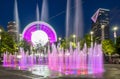 Skyview Atlanta Ferris Wheel in motion and Centennial Olympic Park Fountain. Atlanta, GA. Royalty Free Stock Photo