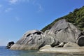 Huge smooth ancient boulders lie on the shores Royalty Free Stock Photo