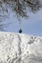 Huge snowhill covered by foot traces. Russian winter.