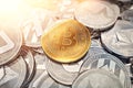 Huge stack of cryptocurrencies with a golden bitcoin on the front as the leader and sun flare as optimistic prediction Royalty Free Stock Photo