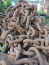 Huge stacks of chains, rusty, common in harbors.