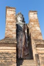 Huge standing Buddha sculpture in Wat Mahathat in the Historical Park of Sukhothai, Thailand, Asia Royalty Free Stock Photo