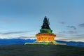 Huge statue of buddha at dusk Royalty Free Stock Photo