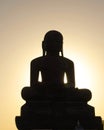 A huge statue of Mahavira on top of a hill