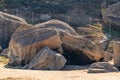 Huge stone boulders on the mountainside. Grotto Royalty Free Stock Photo