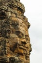 Huge stone face, Bayon Temple, Angkor Wat complex, UNESCO Site, Cambodia Royalty Free Stock Photo