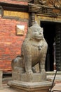 A huge stone lion guarding Patan Museum in Patan, Nepal