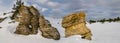 huge stones covered by snow