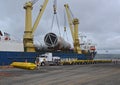 A huge storage vessel is loaded onto a heavy haulage vehicle