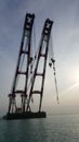 Huge tall crane at sea at kuwait.