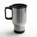 Huge thermocup with black comfortable handle Royalty Free Stock Photo