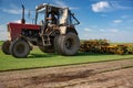 Huge tractor in the field - In a nice blue sunny day