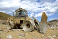 Huge tractor for moving trash in a dump